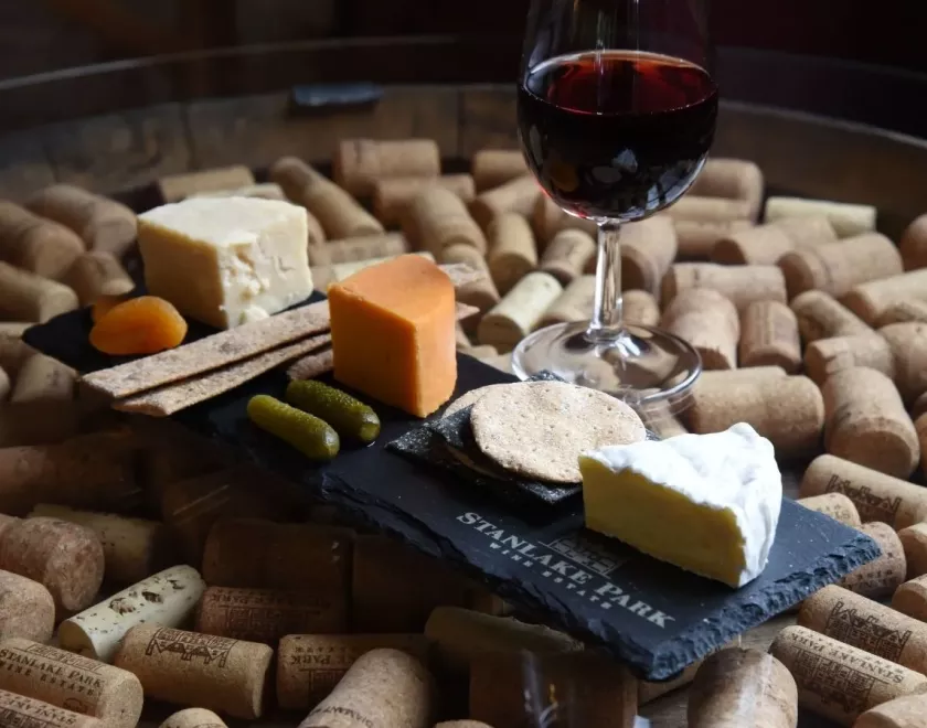 A taste of cheese and wine.