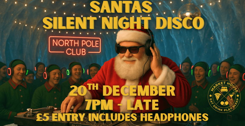 Santa Claus on the DJ decks with a crowd of elves behind him wearing light up head phones