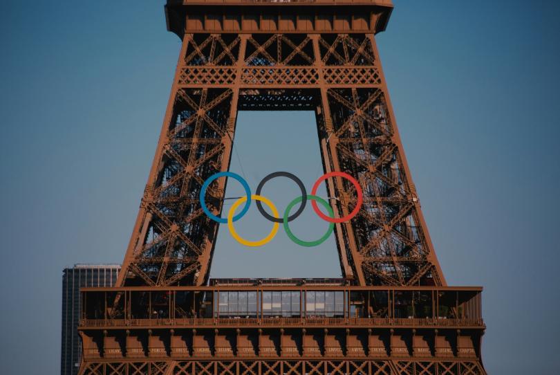 Olympic logo over the Eiffel Tower