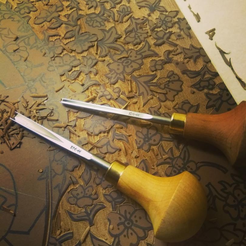 Lino print being carved out