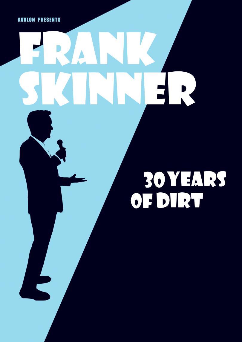 Silhouette of Frank Skinner in a blue spotlight beam