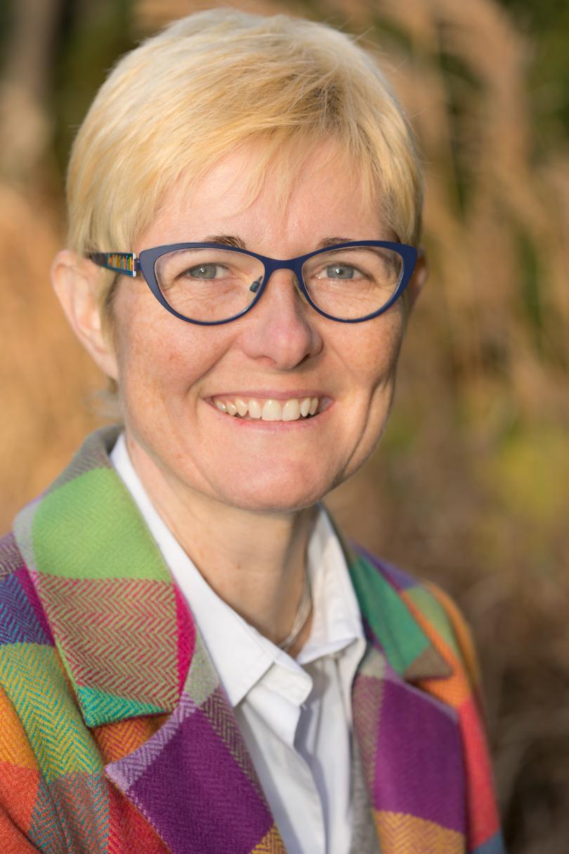 Picture of Fiona Barker head and shoulders in a colourful coat