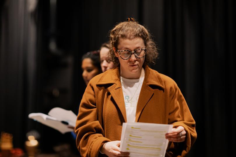 Lady reading a script