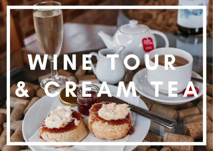 Sparkling wine, afternoon tea and some scones with jam and cream