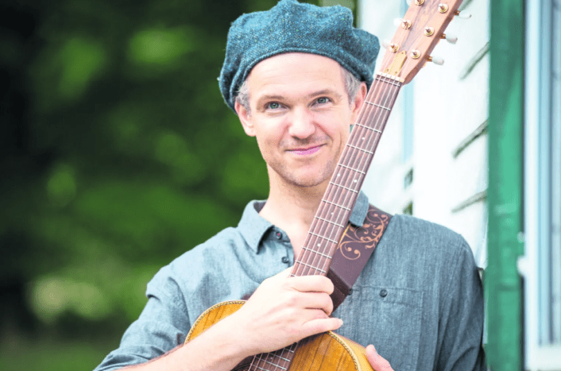 Luke Concannon with guitar