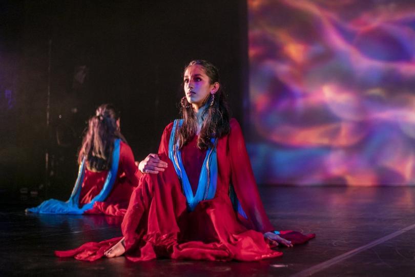 Dancer in long red robes