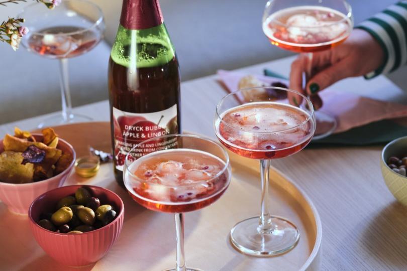 Tray of drinks with the IKEA Sparkling lingonberry drink