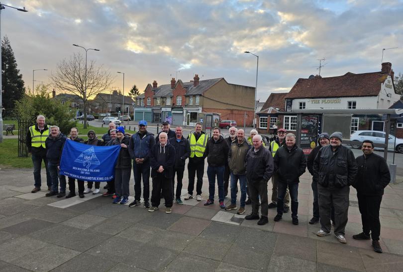 Members of Reading Men Walking and Talking (MWAT) group standing in a line