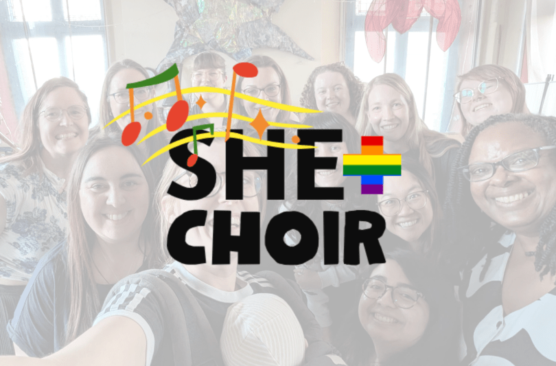 People smiling at the camera with a She+Choir logo overlaid on top