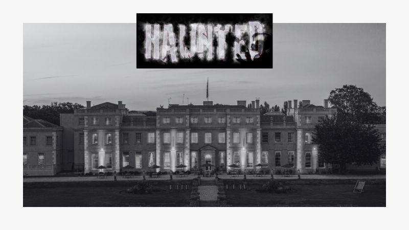 The image shows a black and white photo of the Mansion House with the word "Haunted" at the top in the centre of the image.