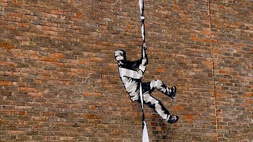 Banksy mural of prisoner escaping from Reading Gaol