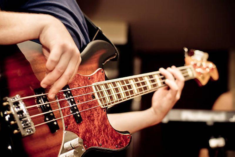 student playing an electric bass