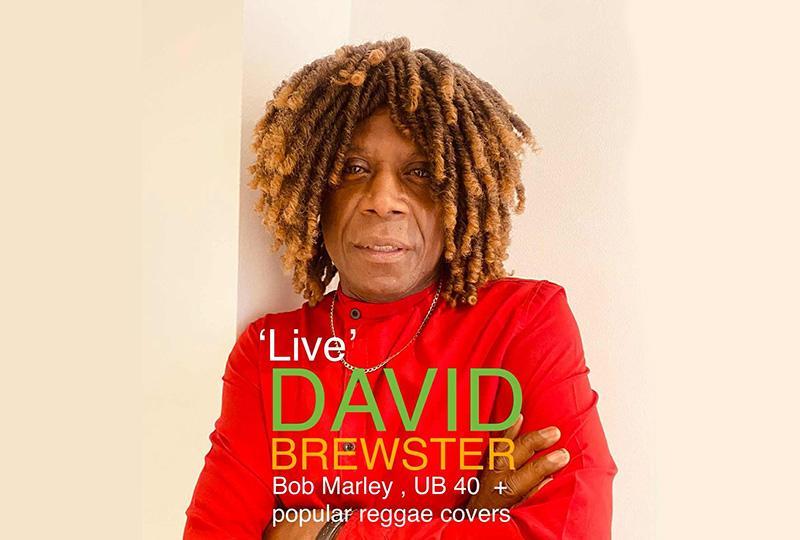 David Brewster wearing a red jumper