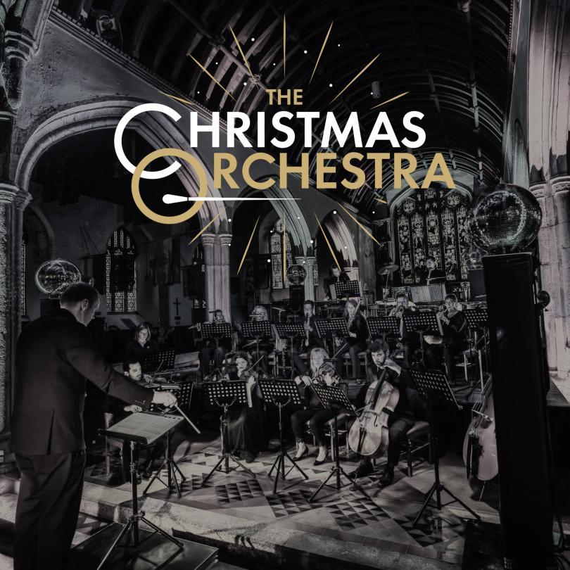 photo of a small chamber orchestra performing in a church