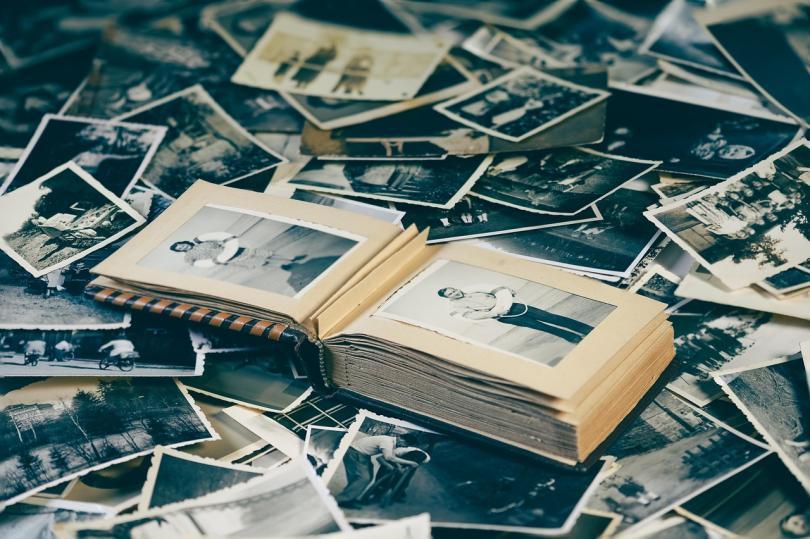 scattered heap of old family photographs