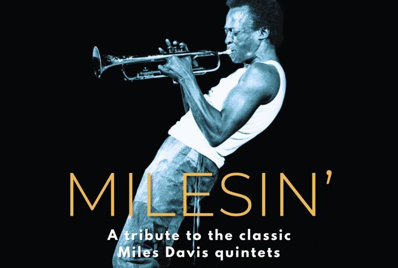 Miles Davis playing the trumpet