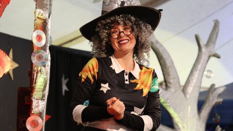 A woman in a witch costume