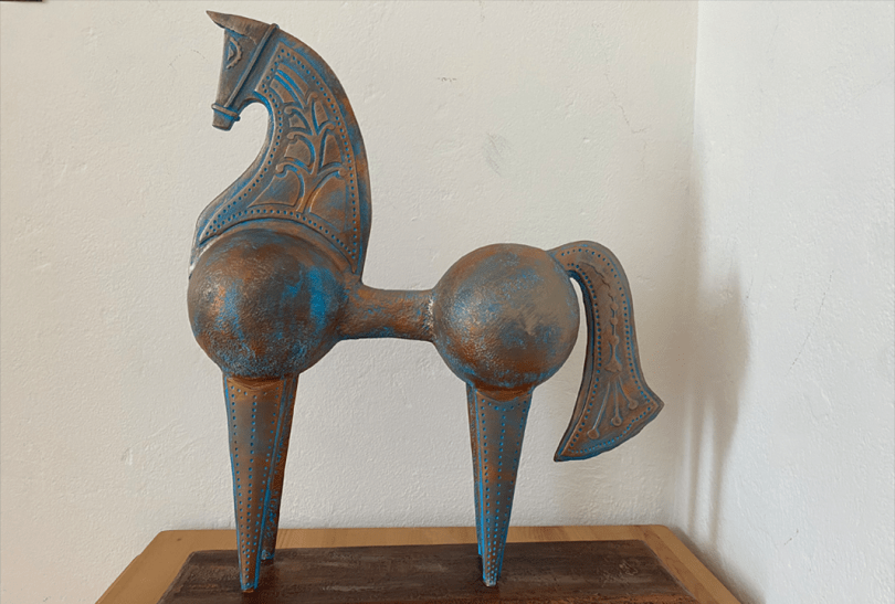 Paper mâché sculpture of a horse in a classical style