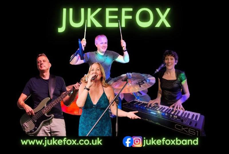 Members of the band Jukefox, all playing their respective instruments