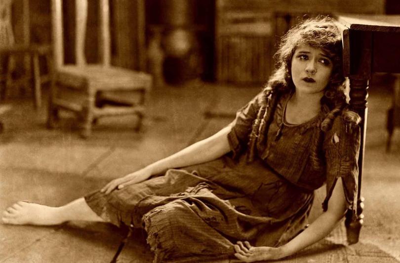 movie still showing young destitute girl