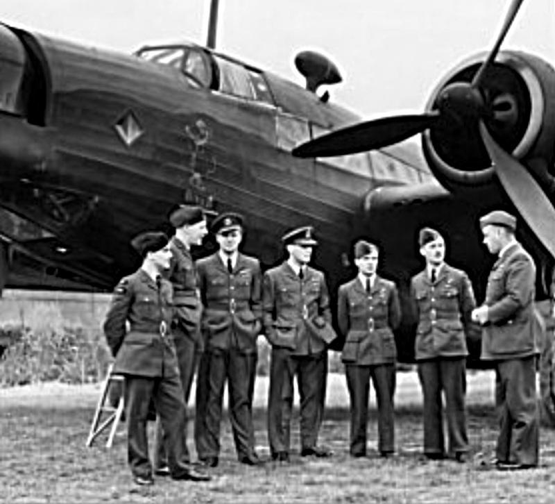 RAF men in front of their plane in World War Two