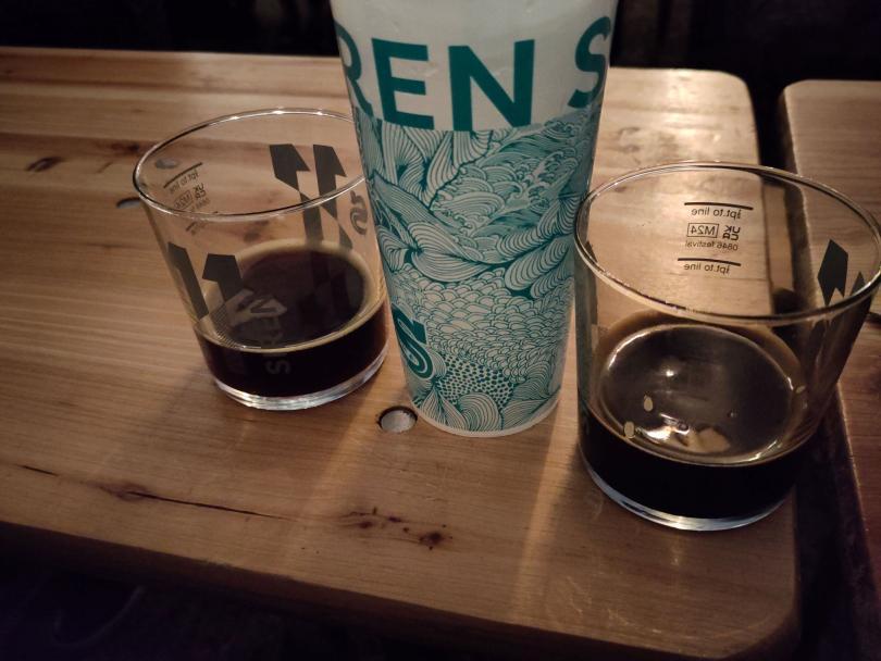 2 dark beers in Siren times 11 half-pint  glasses and a Siren plastic pint glass