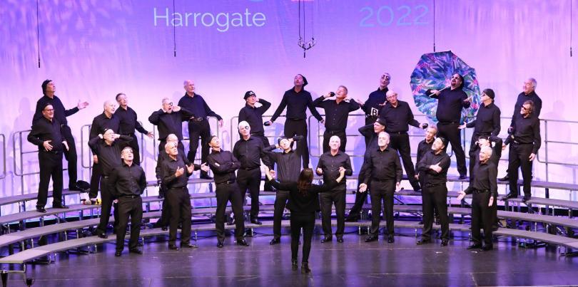 All-male choir on stage