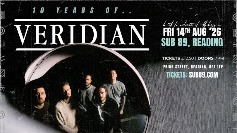 Poster with an image of the band members as if in a camera lens