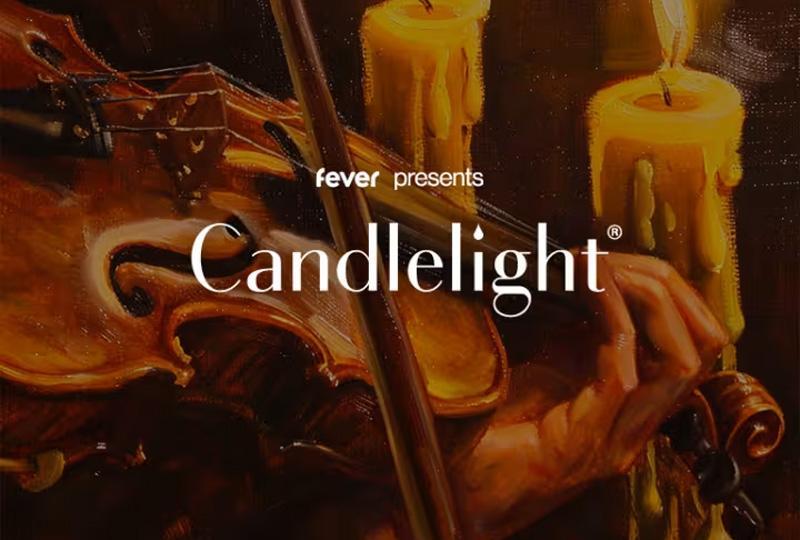 The words "fever presents Candlelight" over a close up painting of a man playing a violin