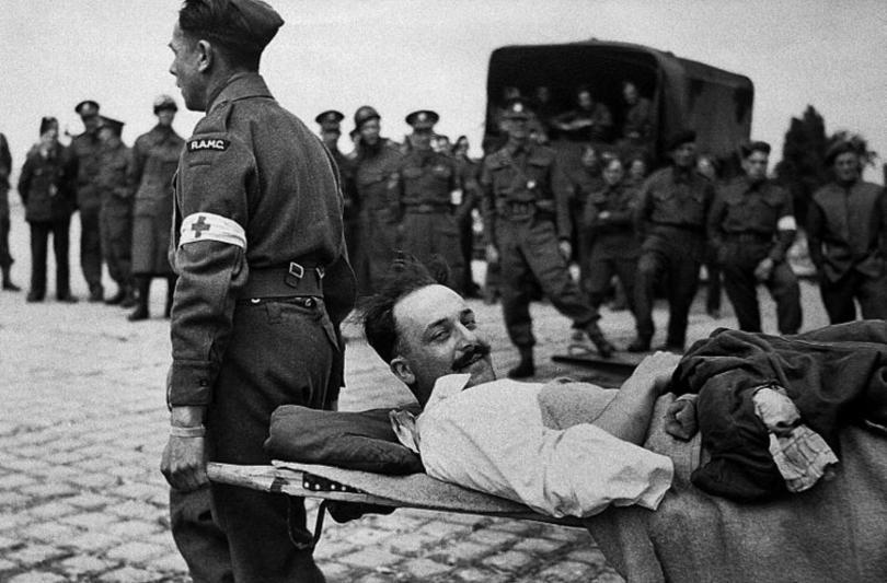 wounded soldier being carried - World War One