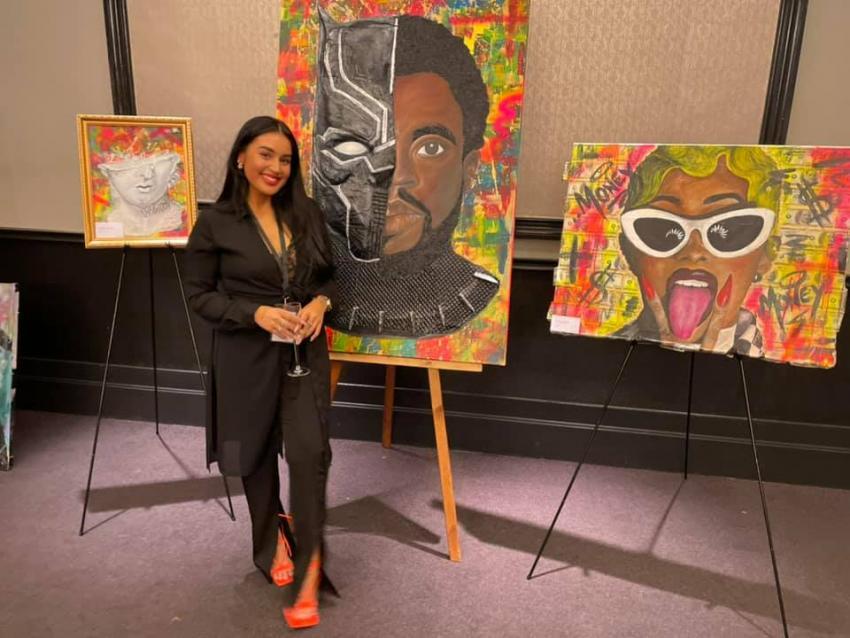 Gemma with three of her paintings