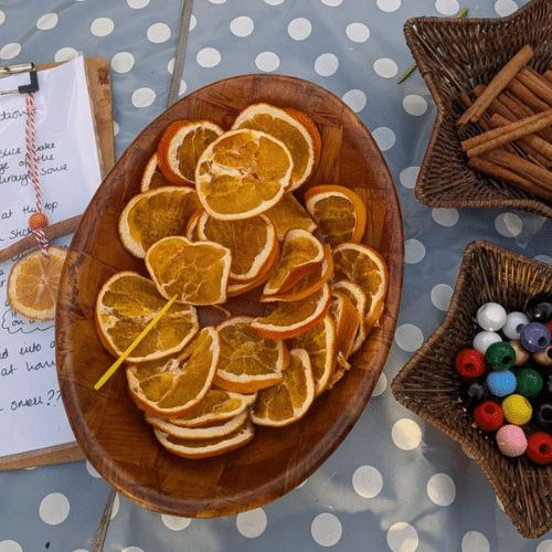 dried oranges and wooden beads