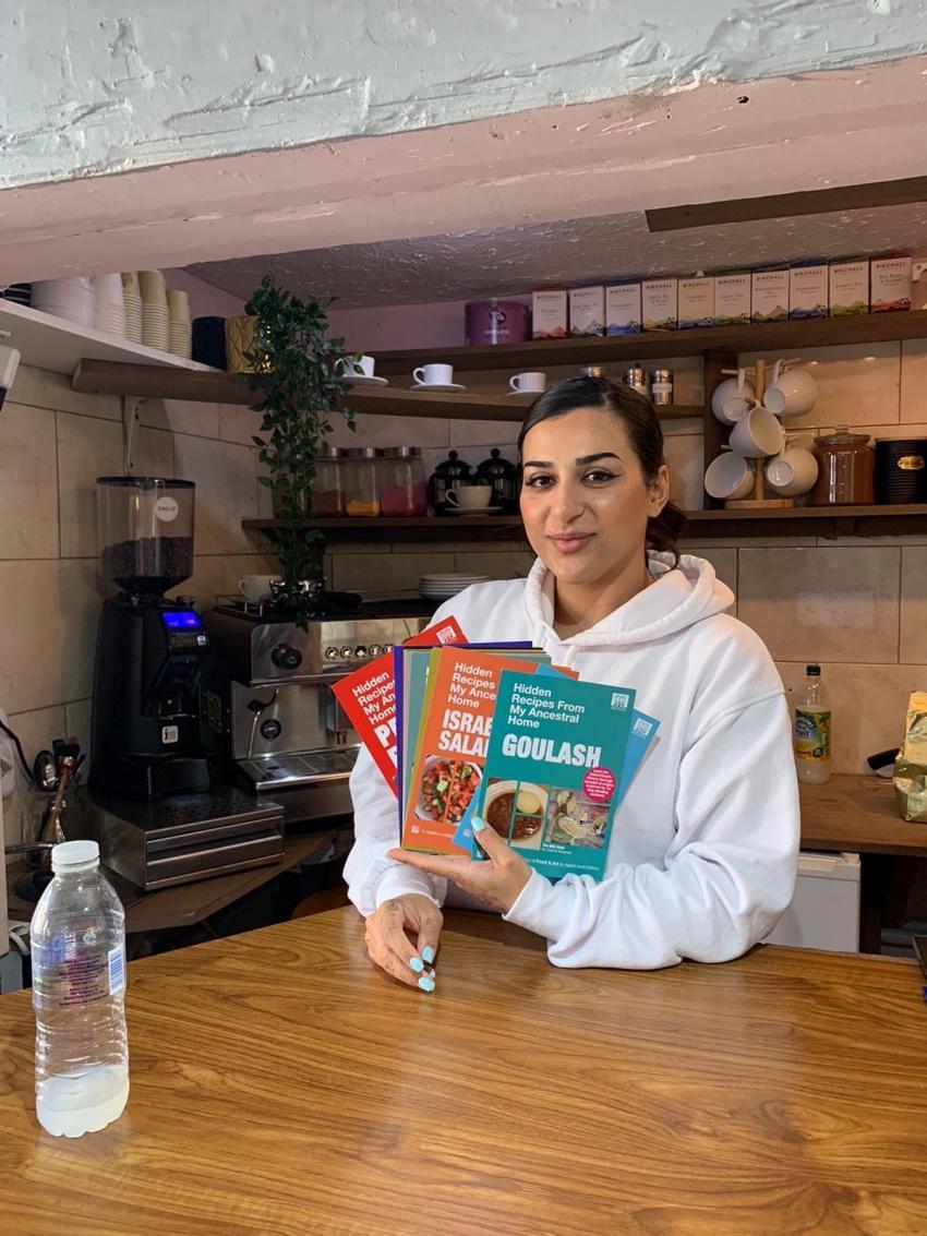 Dailyz Cafe with postcards on display