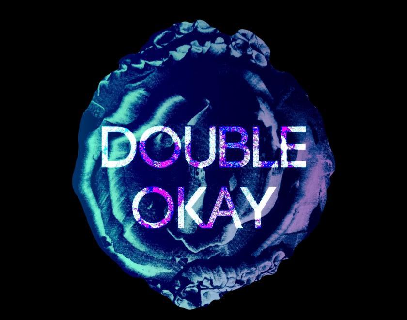 The logo for queer art group Double Okay, based in Reading. Blue tentacles swirled in a circle with glitched text reading Double Okay.