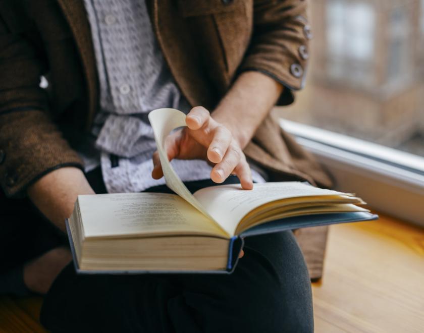 Person reading a book
