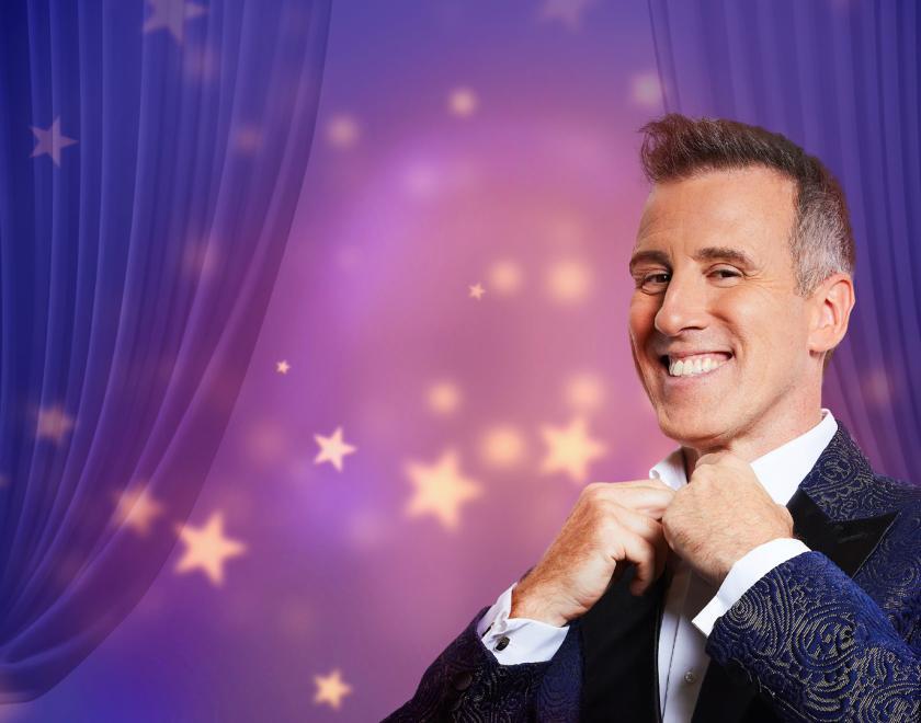 Anton du Beke straightening his tie