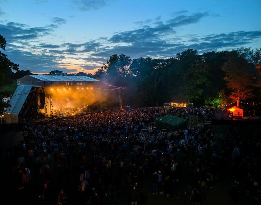 The stage and audience at Wasing Estate, taken at sunset