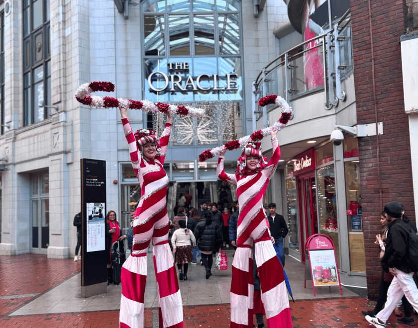 Candy Cane Stilt Walkers in Reading Town Centre