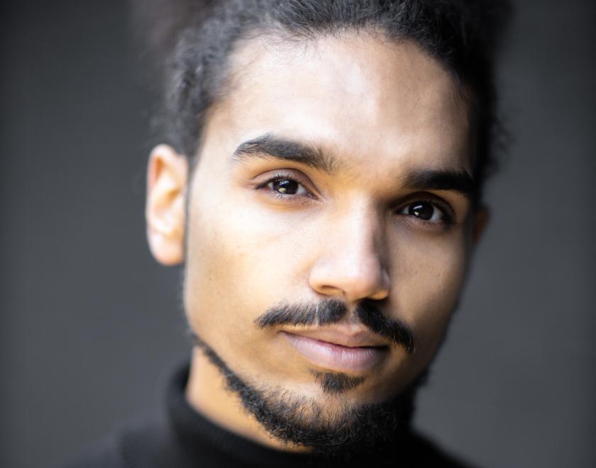 Close-up photo of Leon Newman who is playing Walter Tull