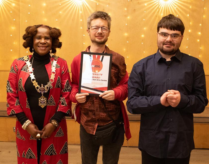 Martin and Phillip from the Rising Sun Arts Centre pose with the Diversity Award certificate alongside the Mayor of Reading
