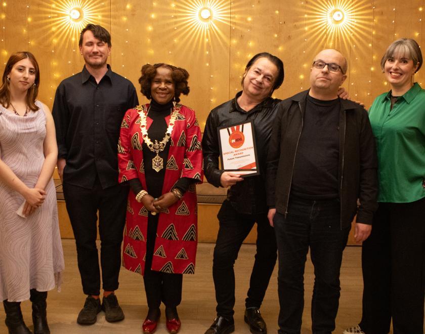 Sid and Nigel from Future Transmissions pose with their Judges' Special Recognition Award certificate alongside presenters Tiam Koravand, Adam Koszay and Lorraine Briffit and the Mayor of Reading