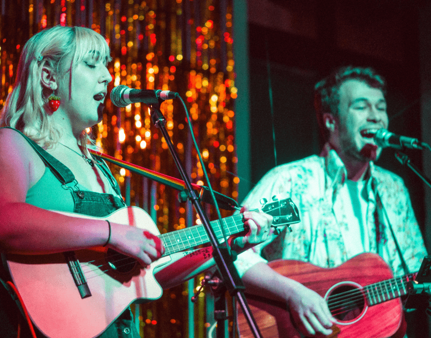 Musical duo performing at Howling @ The Moon