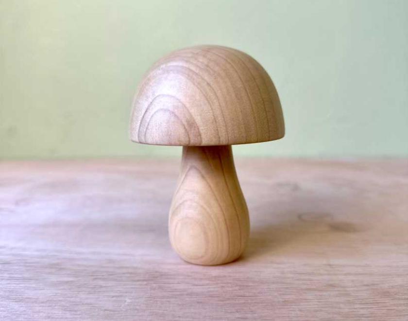 A turned wooden mushroom.