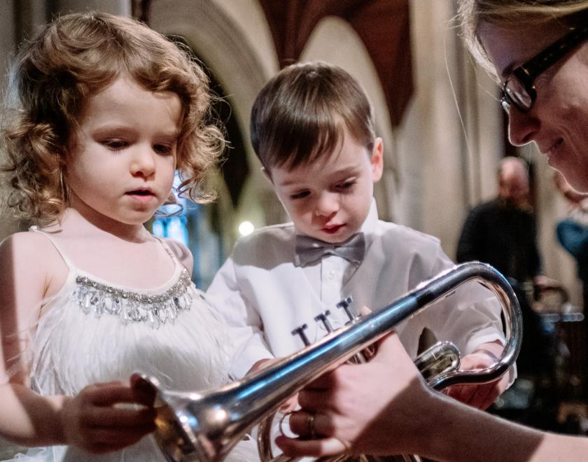 children inspecting trumpet at bach to baby concert
