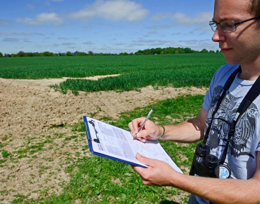 A BBS Surveyor making field notes