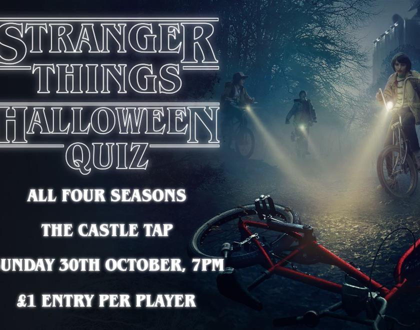 Dark background. Right hand of the image shows three children on bicycles with their headlamps shining through foggy night air at a red bike lying on the floor in the foreground, there are silhouetted trees and a building behind. Left hand of the image has writing in white. Text reads: "Stranger Things Halloween Quiz. All four seasons. The Castle Tap. Sunday 30th October, 7pm. £1 entry per player"