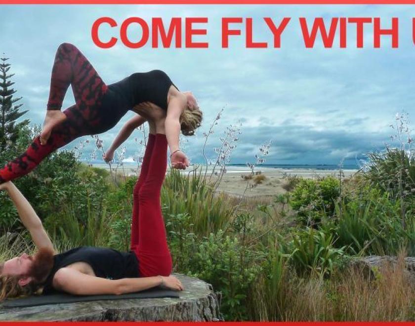 Two acrobats in an acrobatic pose