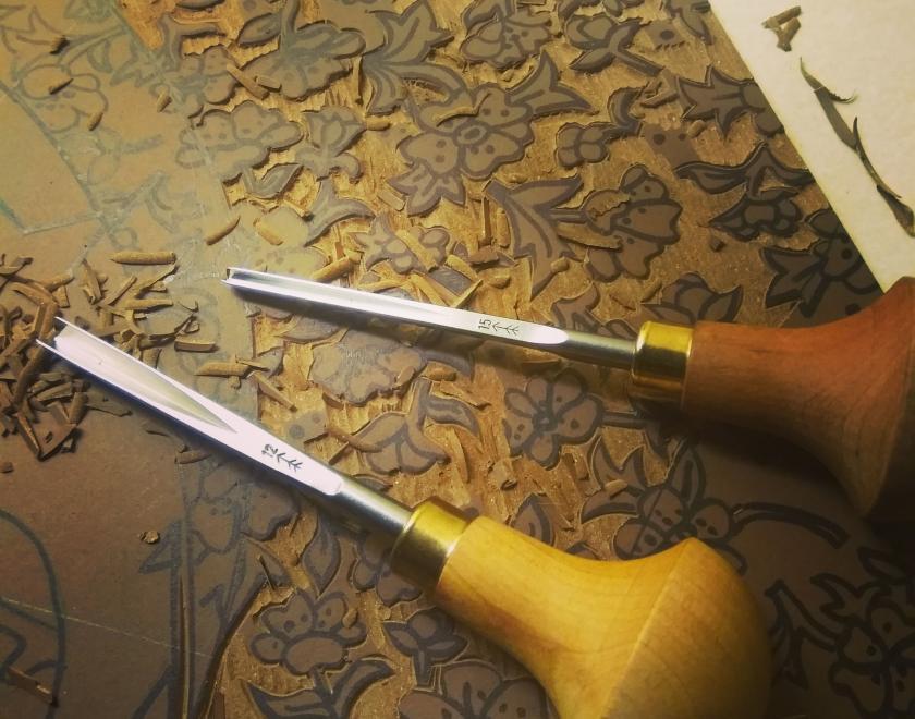 Lino print being carved out