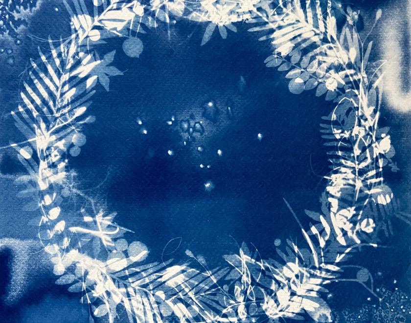 A cyanotype with a wreath design 