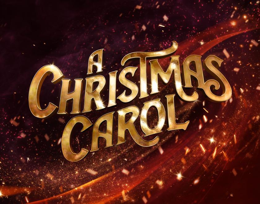 The title A Christmas Carol appears in large gold lettering against a rich red background filled with sparkling lights, swirling ribbons of colour and festive golden particles, creating a magical and celebratory Christmas atmosphere.